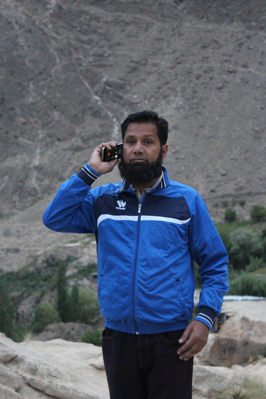 hunza valley, man, phone call, pakistani man, outdoors, landscape, pakistan